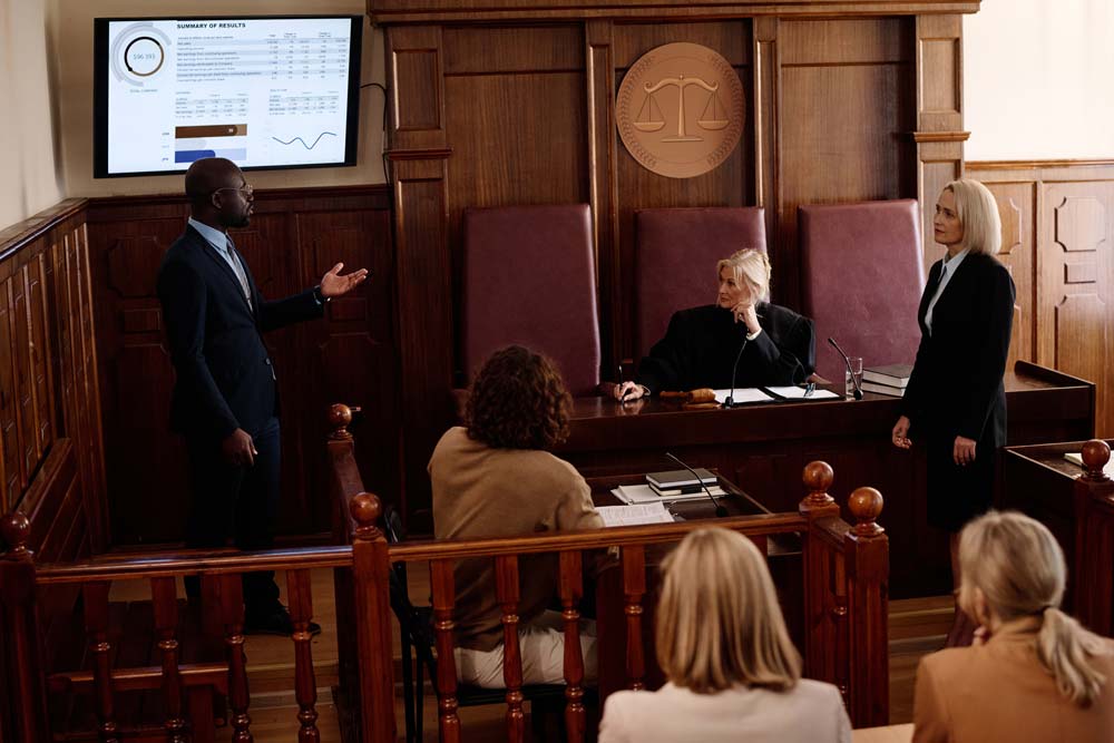 A lawyer using technoloigy in the courtroom
